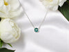 Delicate emerald birthstone pendant on 16-inch silver chain - May's stone of renewal