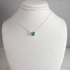 Delicate emerald birthstone pendant on 16-inch silver chain - May's stone of renewal
