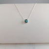 Delicate emerald birthstone pendant on 16-inch silver chain - May's stone of renewal