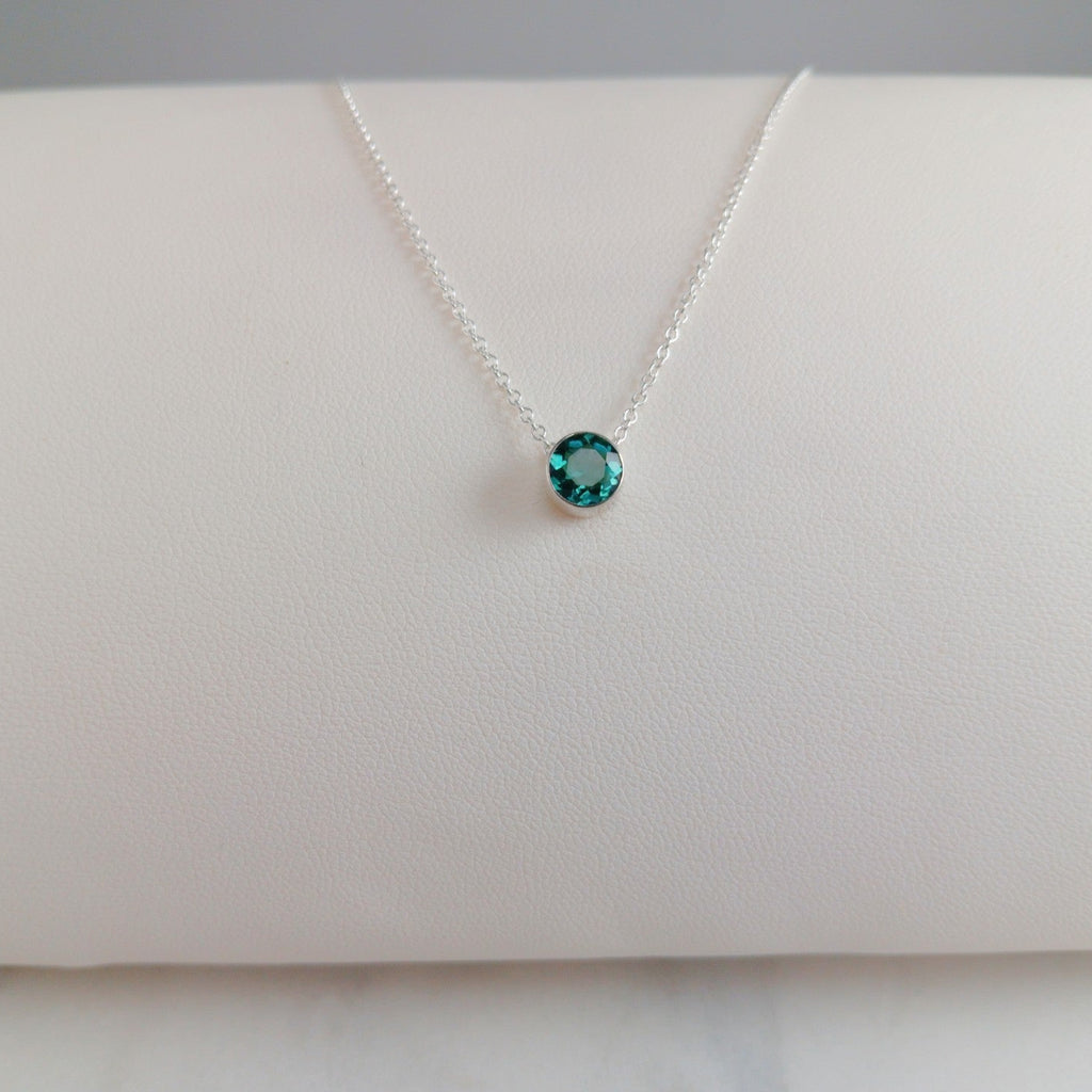 Delicate emerald birthstone pendant on 16-inch silver chain - May's stone of renewal